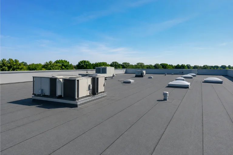 Commercial roofing system on a modern flat commercial building in Mapleridge with durable roofing materials.