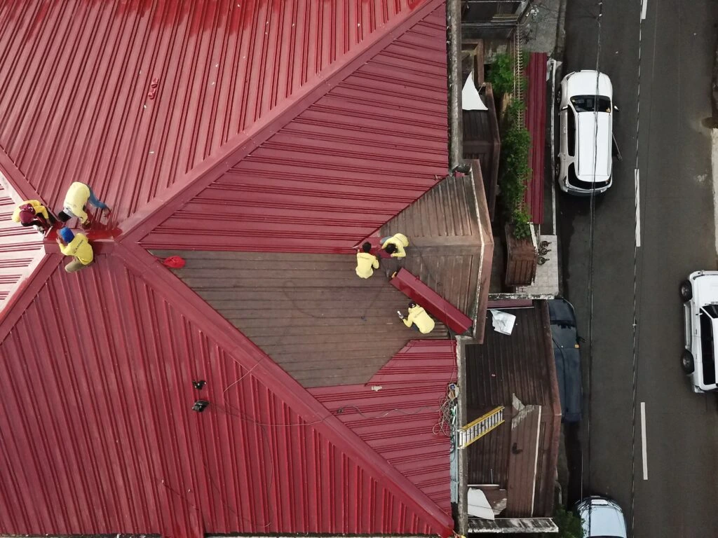 Professional roofing crew replacing an asphalt shingle roof on a residential home in West Hills with high-quality materials and safety equipment.