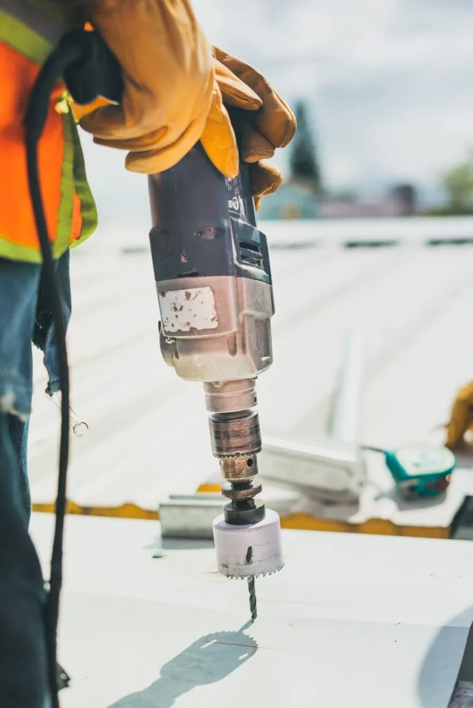Experienced roofing contractors repairing a damaged residential roof in Hillcrest Heights using premium roofing materials and professional safety equipment.