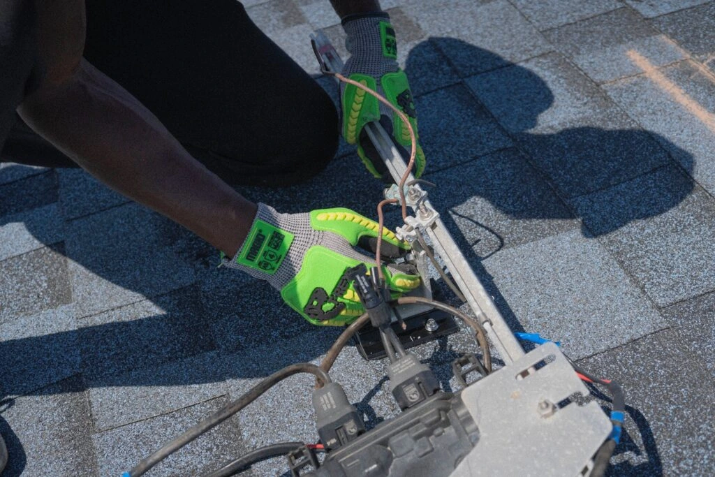 Professional commercial roofing contractors installing a durable flat roof on a commercial building in Boulevard Heights.